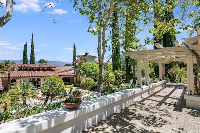 exterior space featuring a pergola