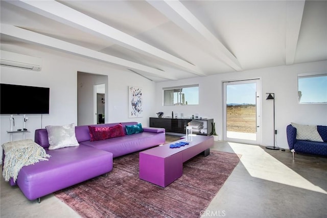 living room featuring lofted ceiling with beams, concrete floors, and an AC wall unit