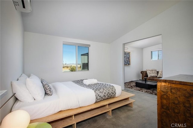 bedroom featuring vaulted ceiling, carpet, and an AC wall unit