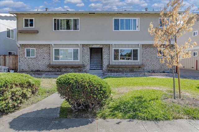 view of front of home with a front yard