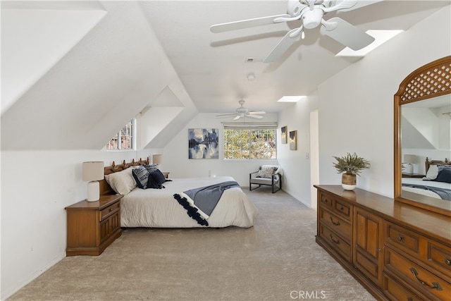 bedroom featuring ceiling fan, light carpet, and lofted ceiling