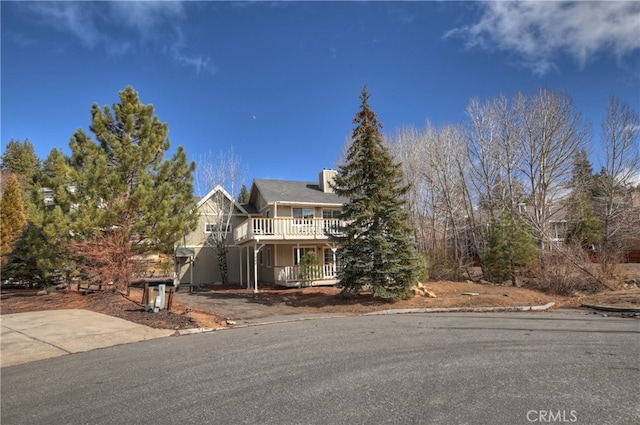 view of front of home with a wooden deck