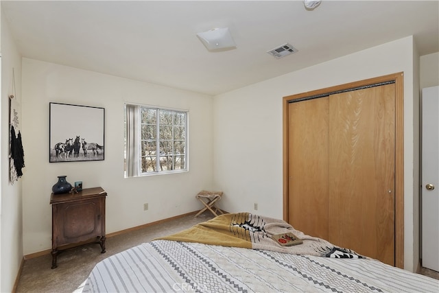 carpeted bedroom with a closet