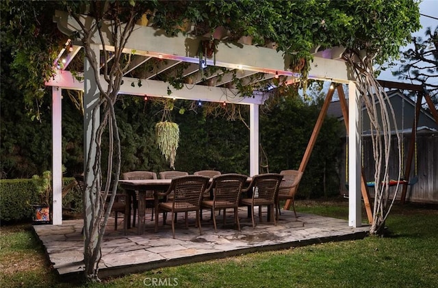 view of patio with a pergola and a playground