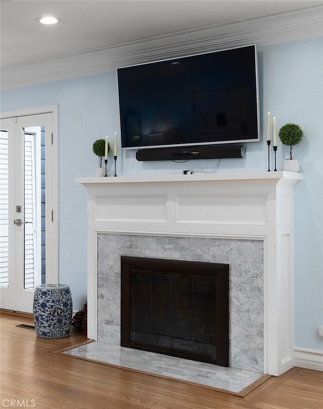 room details featuring hardwood / wood-style floors and ornamental molding