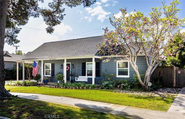 view of front of home featuring a porch and a front lawn