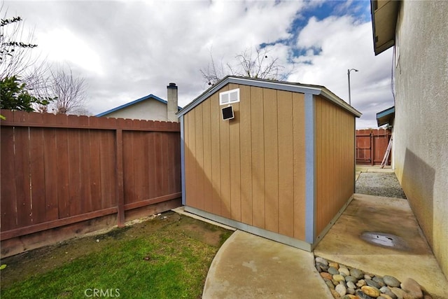 view of property exterior with a shed