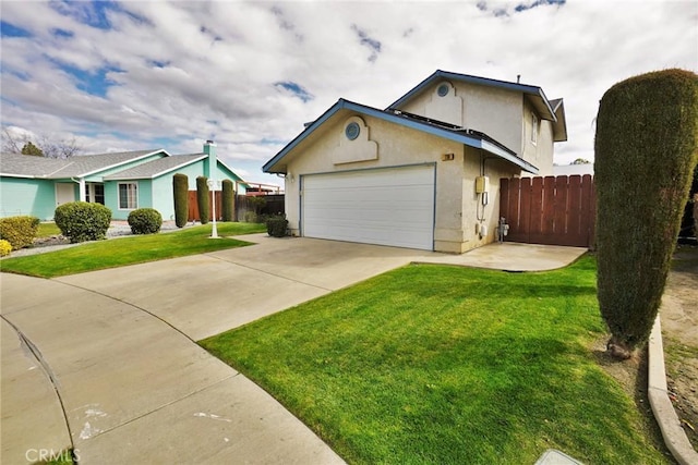 ranch-style home featuring a garage and a front lawn