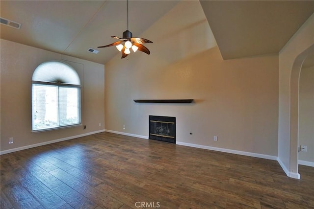 unfurnished living room featuring ceiling fan, dark hardwood / wood-style floors, and high vaulted ceiling