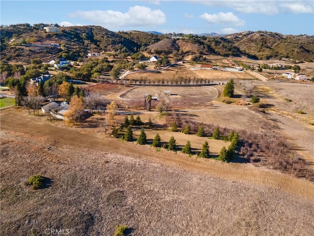 mountain view featuring a rural view