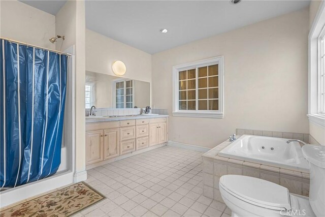 bathroom featuring vanity, tile patterned floors, and independent shower and bath