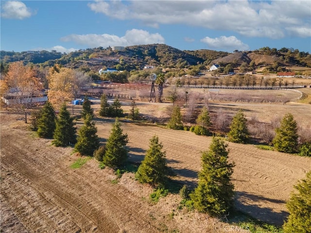 property view of mountains featuring a rural view