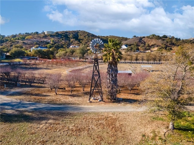 view of mountain feature featuring a rural view