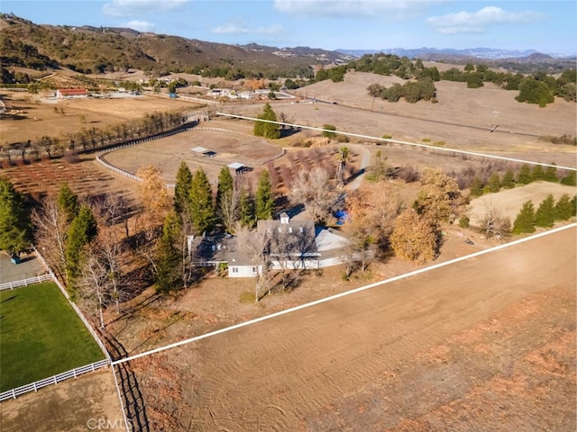 aerial view featuring a mountain view and a rural view