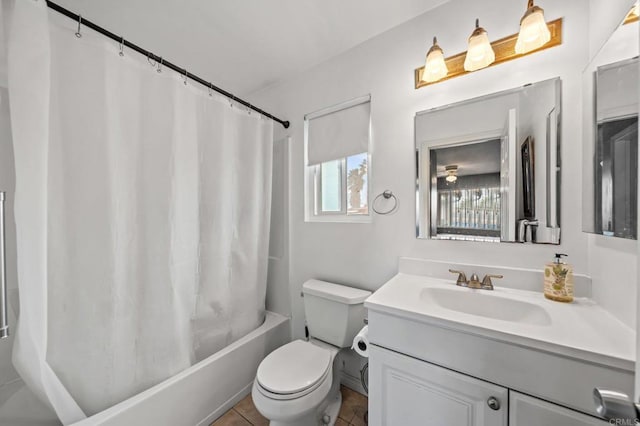 full bathroom featuring vanity, tile patterned flooring, toilet, and shower / bathtub combination with curtain