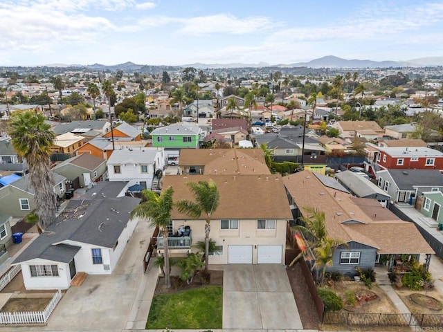 drone / aerial view featuring a mountain view