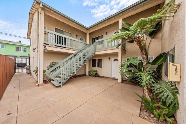 3565 Highland Ave Unit 5, San Diego, CA 92105 - view of building exterior with stairs and fence