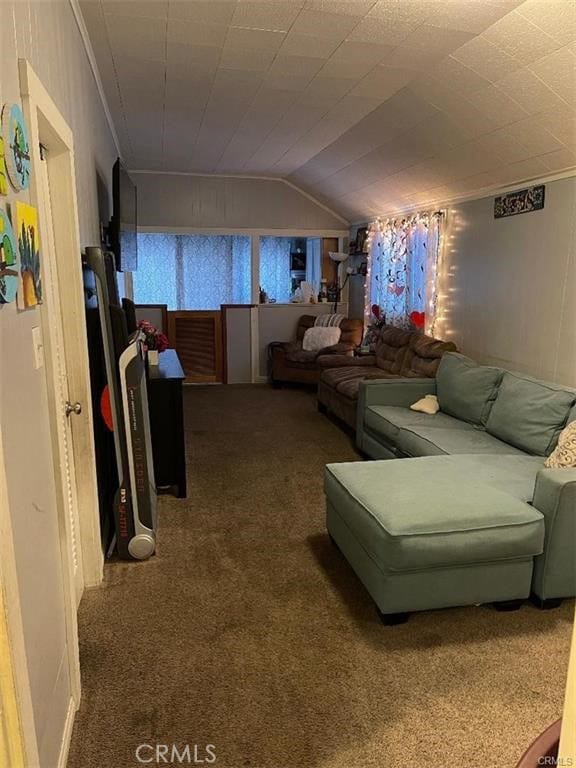 carpeted bedroom featuring lofted ceiling and crown molding