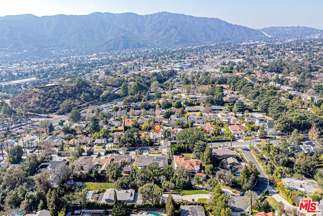 drone / aerial view featuring a mountain view