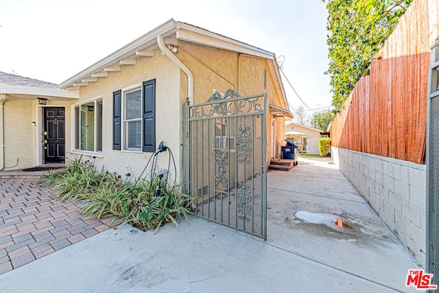 view of home's exterior featuring a patio area