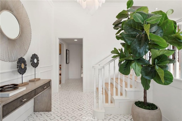 interior space with crown molding