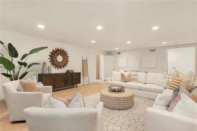 living room with light hardwood / wood-style floors