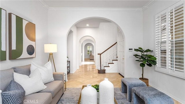 living room featuring tile patterned flooring and crown molding