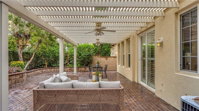 view of patio / terrace featuring a pergola and an outdoor hangout area