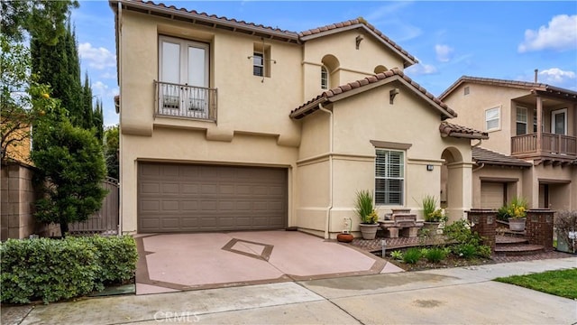 mediterranean / spanish-style house featuring a garage