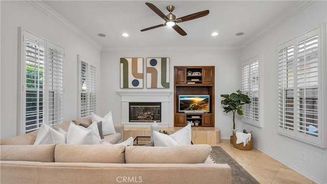 tiled living room featuring crown molding and ceiling fan