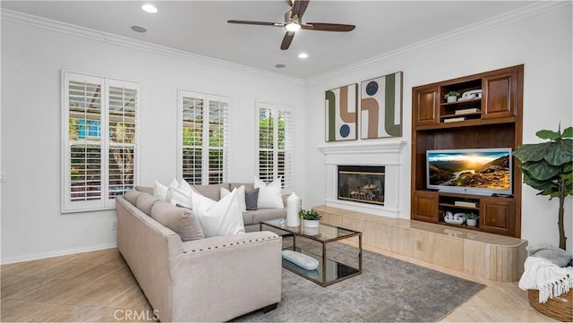 living room featuring ceiling fan and ornamental molding