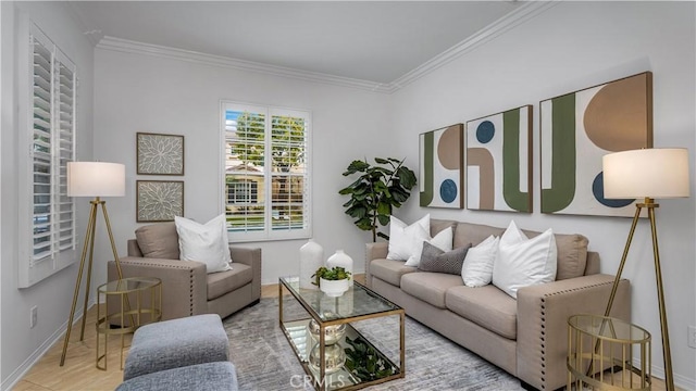 living room featuring ornamental molding and light wood-type flooring