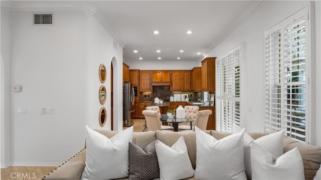 living room featuring ornamental molding