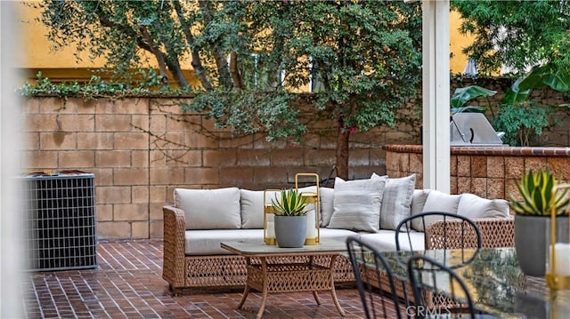 balcony with a patio and an outdoor hangout area