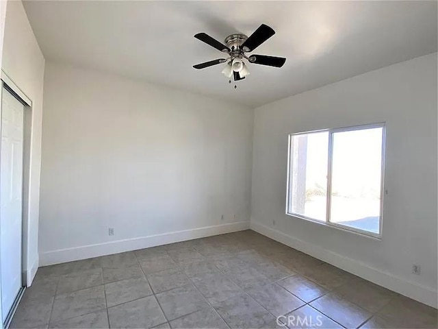 empty room featuring ceiling fan