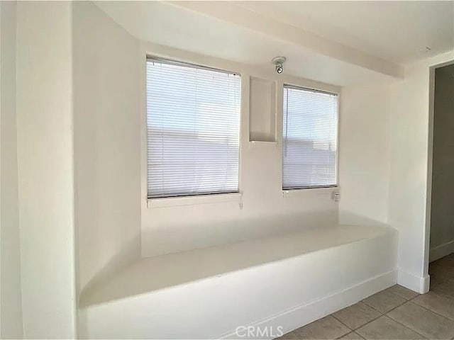 interior space with tile patterned floors