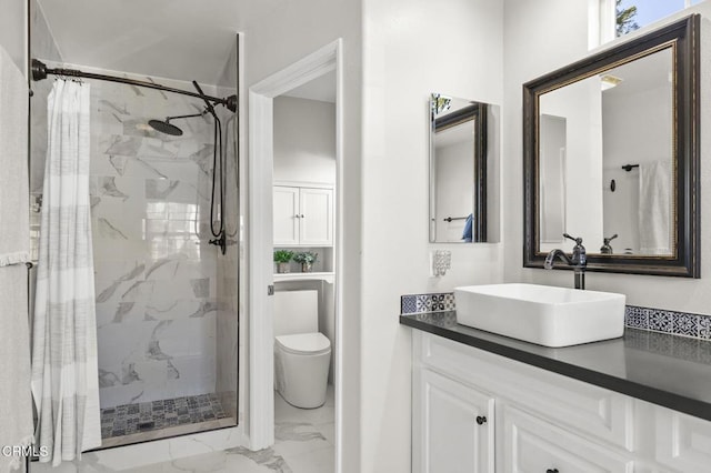 bathroom with vanity, a shower with curtain, and toilet