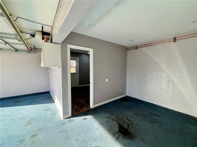 garage with baseboards