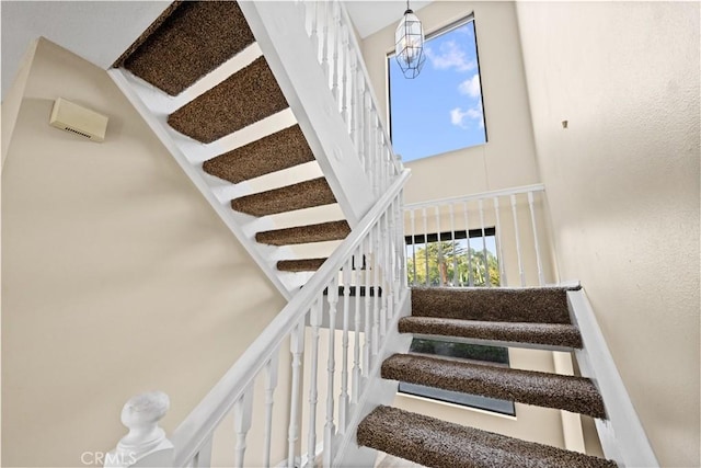 30340 Channel Way Dr, Canyon Lake, CA 92587 - stairway with a towering ceiling