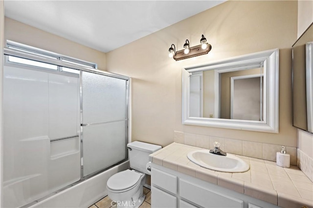 30340 Channel Way Dr, Canyon Lake, CA 92587 - full bathroom featuring vanity, enclosed tub / shower combo, and toilet