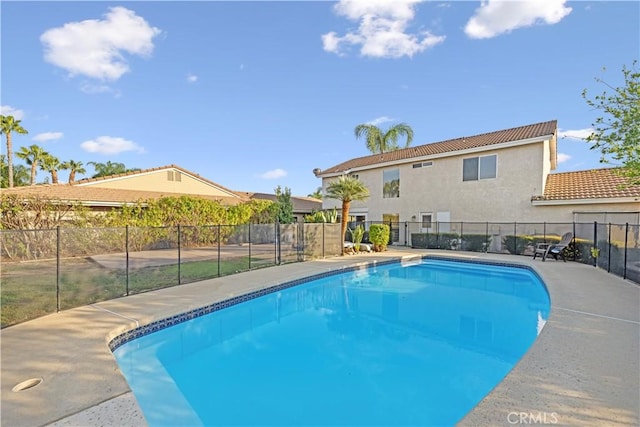 view of swimming pool featuring a fenced in pool and fence