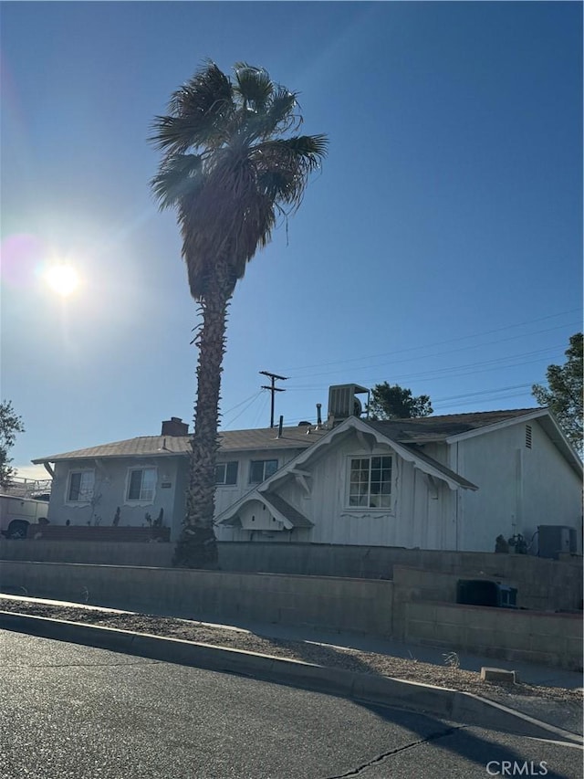 view of front of property featuring central air condition unit