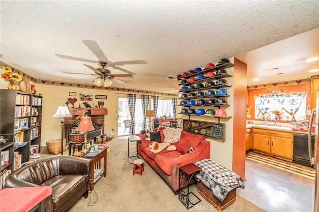 living room featuring ceiling fan, sink, light colored carpet, and a textured ceiling