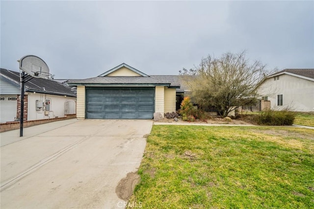 single story home featuring a garage and a front yard