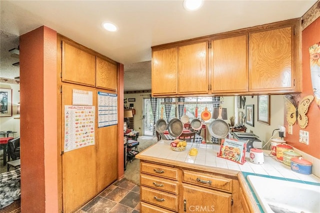 kitchen with sink and tile countertops