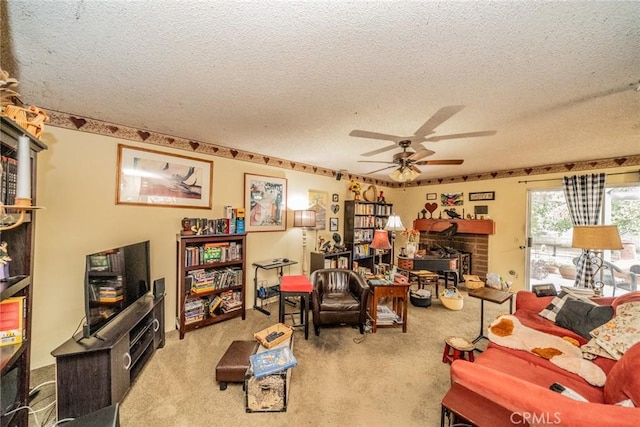 interior space featuring ceiling fan, light colored carpet, and a textured ceiling