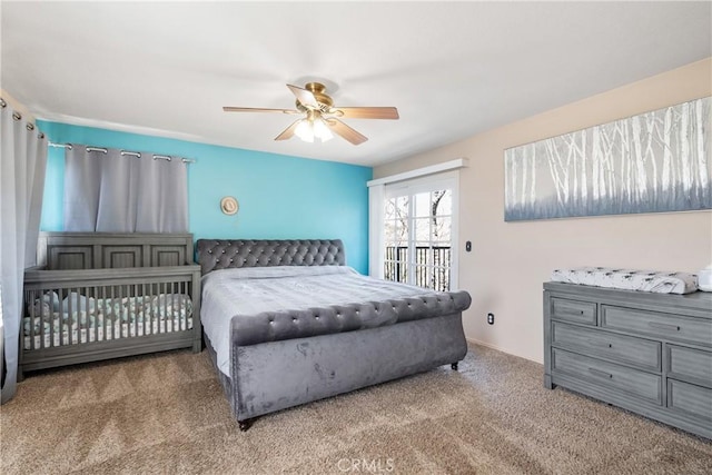 bedroom with access to exterior, carpet flooring, and ceiling fan