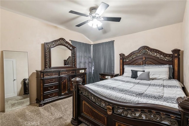 carpeted bedroom with lofted ceiling and ceiling fan