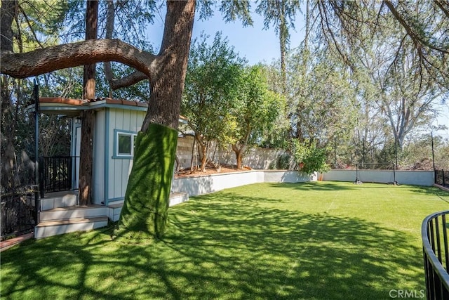 view of yard with a fenced backyard