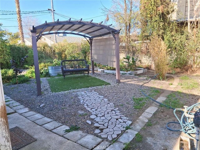 view of yard with a pergola